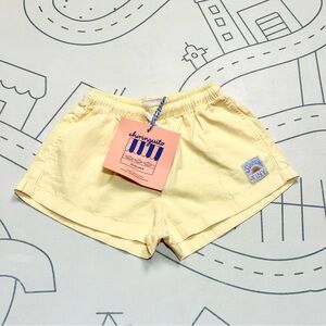 TinyCottons SunFan Solid Shorts in Lemonade